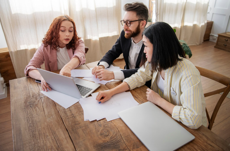 family reviewing bundling insurance pros and cons with financial advisor at home