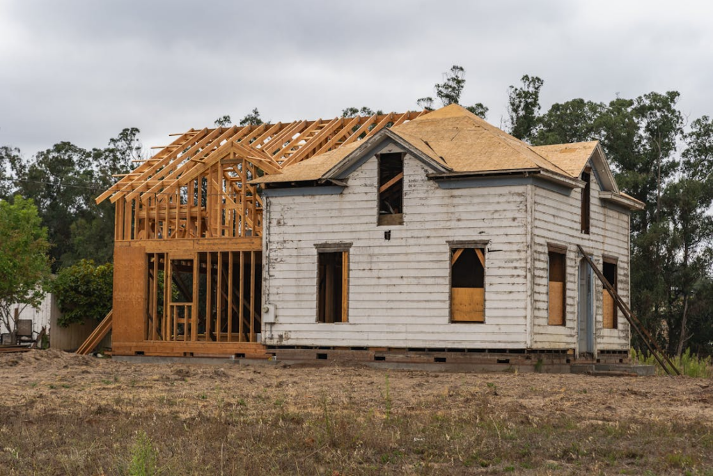 home under construction showing how inflation affects insurance coverage rebuilding costs