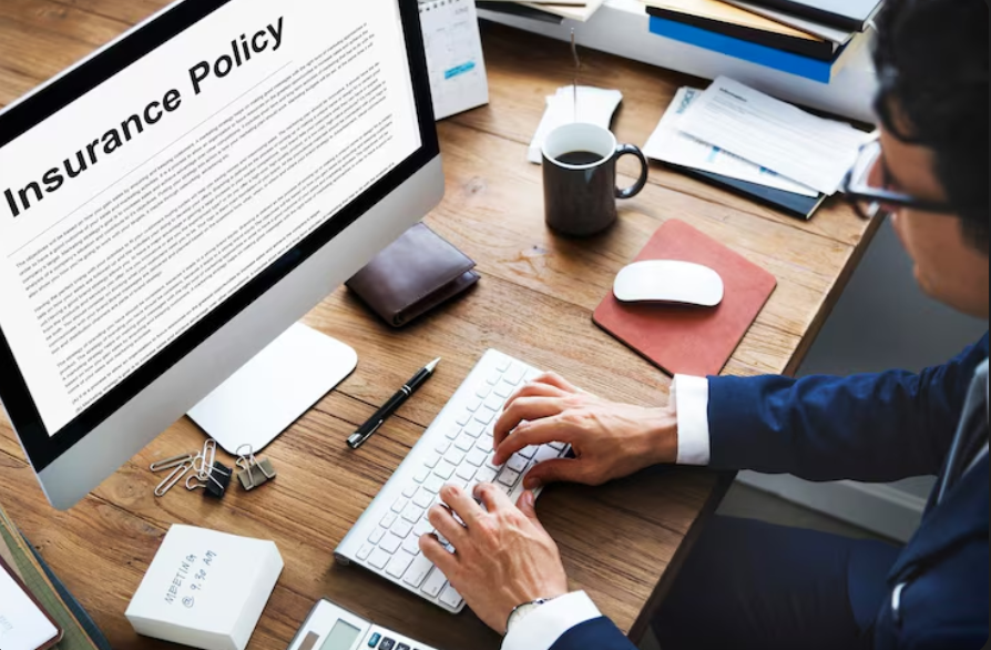 person reviewing policy document illustrating how often to review insurance policies